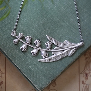 Antiqued silver vintage style victorian bellflower lily of the valley necklace.