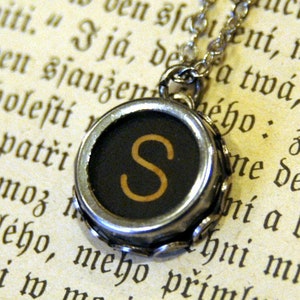 Vintage typewriter key necklace.