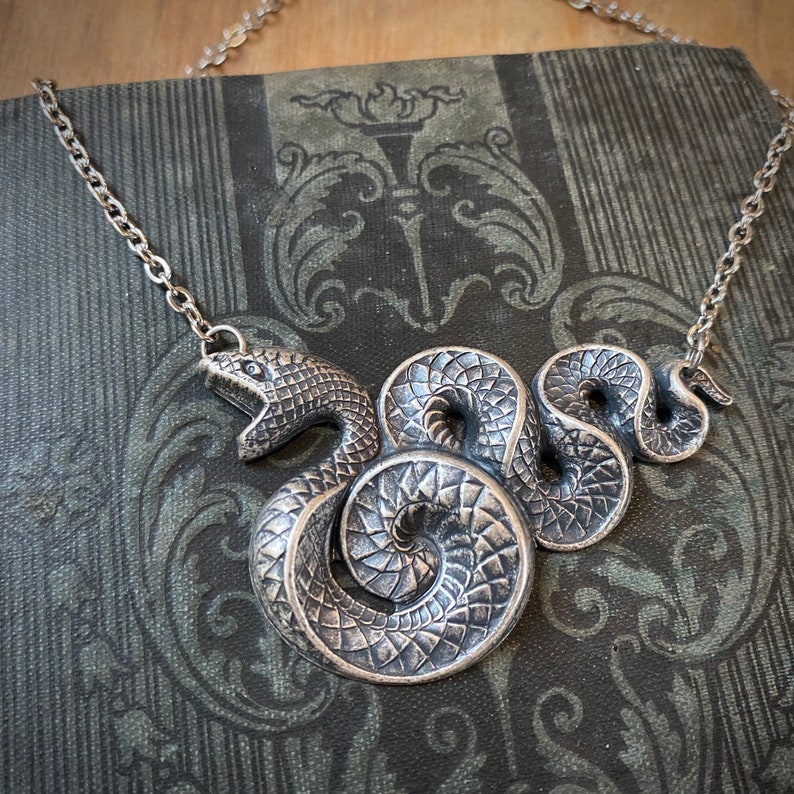 Antiqued silver vintage style gothic snake necklace.