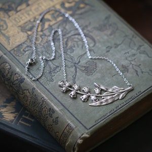 Antiqued silver vintage style victorian bellflower lily of the valley necklace.