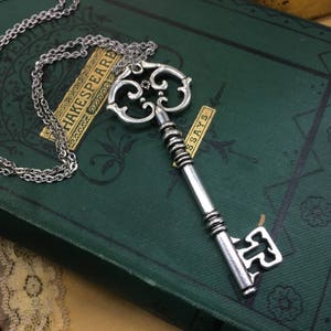 Silver skeleton key pendant necklace with 30 inch chain. Ragtrader