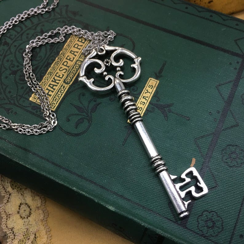 Silver skeleton key pendant necklace with 30 inch chain. Ragtrader