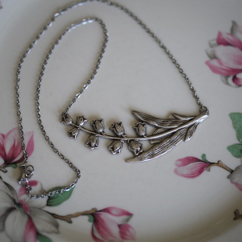 Antiqued silver vintage style victorian bellflower lily of the valley necklace.