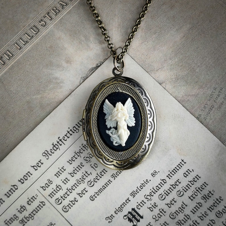 Angel Cameo Locket long necklace in antiqued brass in vintage style.