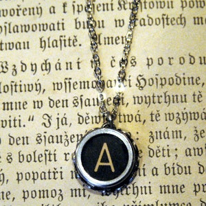 Vintage typewriter key necklace.