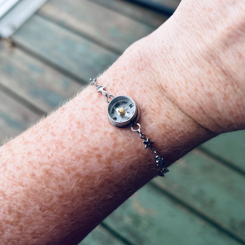small working compass on an adjustable silver bracelet chain