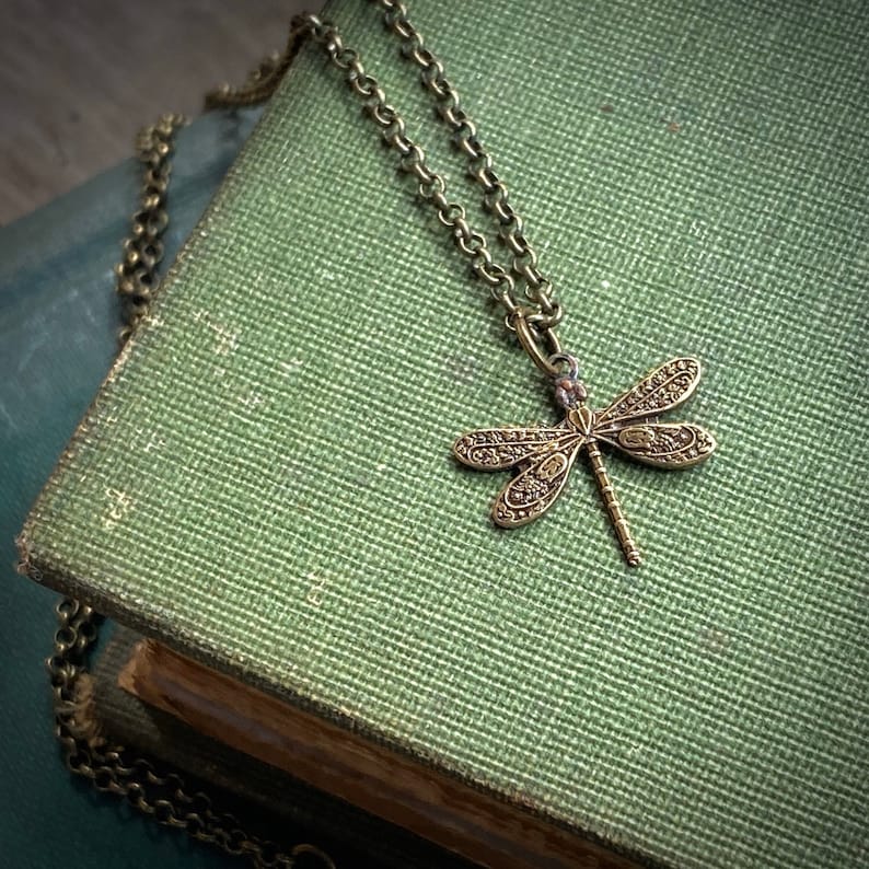 Small intricate antiqued brass dragonfly necklace in vintage style by ragtrader.