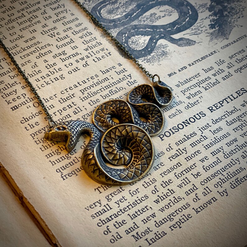 Antiqued brass vintage style gothic snake necklace.