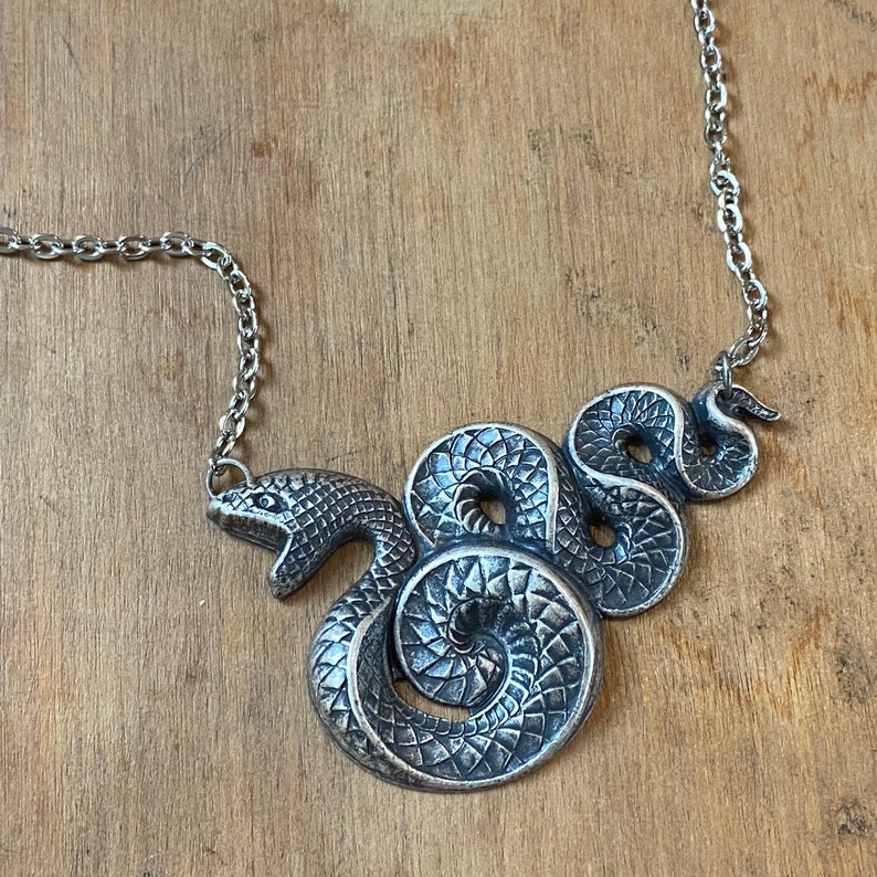 Antiqued silver vintage style gothic snake necklace.