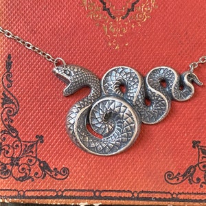 Antiqued silver vintage style gothic snake necklace.