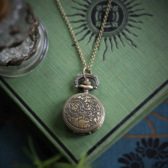 Timepiece necklace best sale
