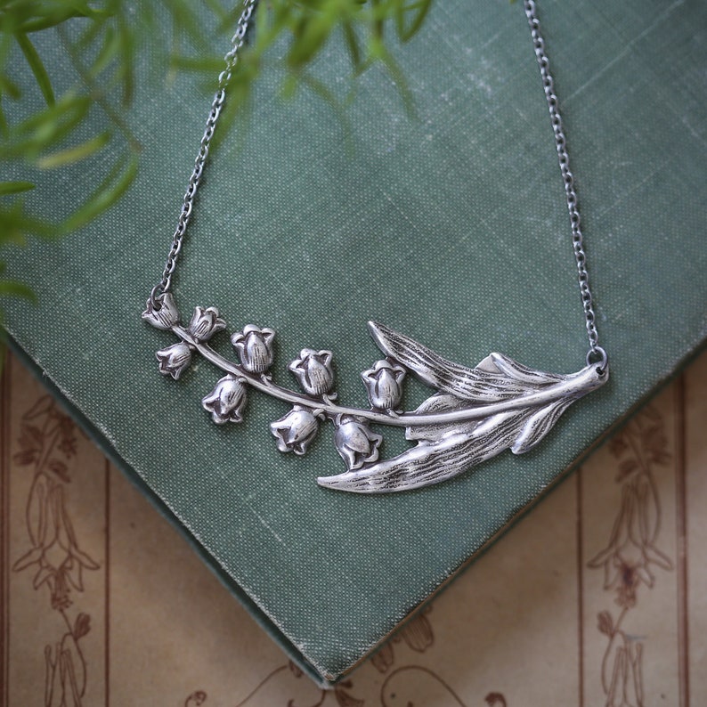 Antiqued silver vintage style victorian bellflower lily of the valley necklace.