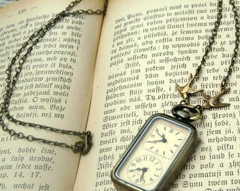 Double Faced Working Watch Necklace in Bronze.  Battery operated
