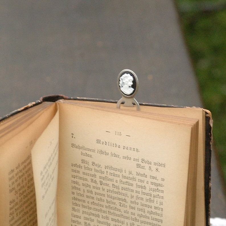 Antique silver plated over brass black and white cameo bookmark
