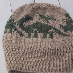 child dinosaur knit beanie hat - boy or girl, green and beige tan