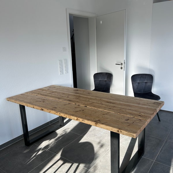 Dining table made of scaffolding planks