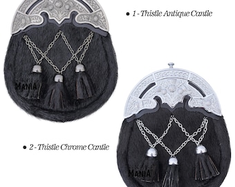 May include: Two black faux fur sporrans with silver thistle cantles. The sporran on the left has an antique silver cantle, and the sporran on the right has a chrome silver cantle. Both sporrans have three chains and tassels.