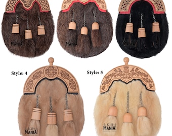 Può includere: Cinque stili diversi di sporran per kilt, ognuno con un'unica parte superiore in legno intagliato e tre nappine. Gli sporran sono realizzati in pelliccia marrone, nera e beige.