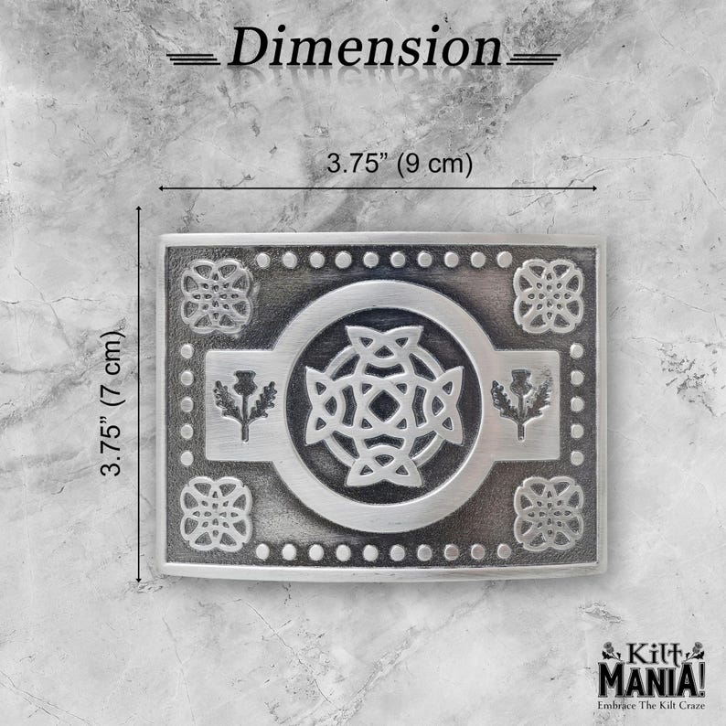 May include: A rectangular silver-colored kilt belt buckle with Celtic knot and thistle designs. The buckle measures 3.75 inches (9 cm) wide and 3.75 inches (7 cm) tall. The text "Dimension" is at the top, and the brand name "Kilt Mania!" is at the bottom.