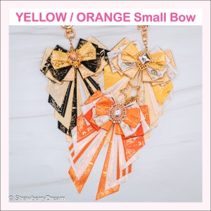 Fiocco luminoso GIALLO / ARANCIONE piccolo / Anime Ita Bag Deco / Decorazione Kpop / Portachiavi per borsa / Fiocco con nastro da concerto / Papillon