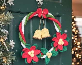May include: A circular crochet wreath featuring twisted red, white, and green yarn strands. The wreath is decorated with two red crochet poinsettia flowers with yellow centers, green leaves, and two hanging gold crochet bells topped with a red bow.