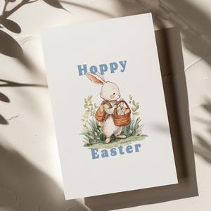 Carte de Pâques imprimable lapin de Pâques houblonné | Téléchargement numérique| Lapin mignon avec panier d'oeufs | Célébration du printemps| Téléchargement instantané| Vierge
