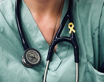 The Doctor's Stethoscope charm with yellow ribbon to support Israel Hostages