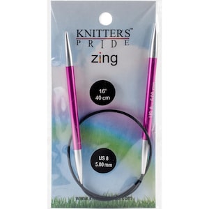 May include: A pair of 16-inch pink knitting needles with a black cord. The needles are size US 8 (5.00 mm) and are labeled "Knitter's Pride zing".