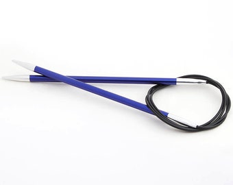 May include: A pair of blue circular knitting needles with a black cord. The needles are made of metal and have a silver tip.
