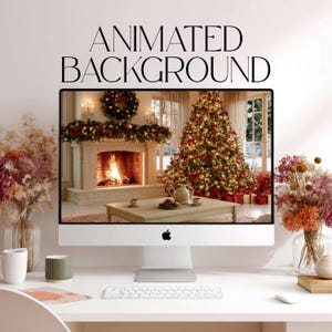 May include: A silver desktop computer monitor displaying an animated background of a cozy living room with a lit fireplace, a decorated Christmas tree, and a coffee table. The text "ANIMATED BACKGROUND" is printed in black above the monitor.