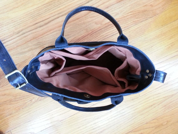 black and brown leather handbolsas