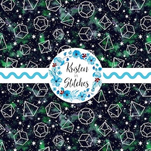 May include: A fabric design featuring a dark blue and green galaxy-like background with white geometric shapes and stars. A circular logo with blue flowers and the text "Kristen in Stitches" is in the center.