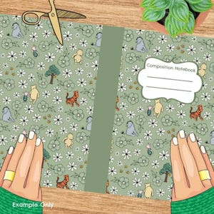 May include: A composition notebook with a green cover featuring a whimsical pattern of cartoon animals, flowers, and trees. The notebook has a white label that reads "Composition Notebook". The words "Example Only" are visible at the bottom left.