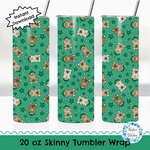 May include: A 20 oz skinny tumbler wrap featuring a repeating pattern of teddy bears wearing green hats and holding balloons, interspersed with green stars on a green background. The words "Instant Download" are in a starburst shape.