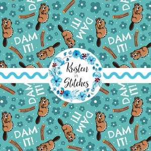 May include: A repeating pattern featuring cartoon beavers, wooden logs, and the phrase "DAM IT!" on a teal background with small white flowers. A circular floral design with the text "Kristen in Stitches" is also present.