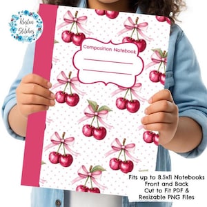 May include: A composition notebook with a pink spine and a white cover featuring a pattern of cherries with pink bows and green leaves. The notebook has the words "Composition Notebook" on the front.