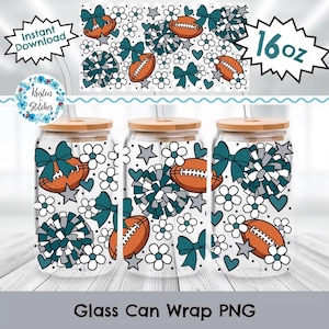 May include: Three clear glass tumblers with bamboo lids and straws, featuring a repeating pattern of brown footballs, teal bows, grey and teal pom-poms, white flowers, grey stars, and teal hearts. The design includes text reading 16oz.