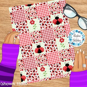 May include: A patchwork quilt with a ladybug and flower design. The quilt features red and white gingham squares, alternating with squares of ladybugs and flowers. The words "Love Bug" are printed on the quilt. The quilt is held by two hands.