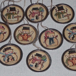 10 ~ 1 1/4 Inch Primitive Metal Rimmed TINY Hang Tags Whimsical Snowman Christmas Holiday Hang Tags Miniature Tree Ornies Gift Ties Accents