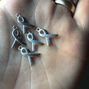 Destash Silvery cancer awareness ribbon charms 100% donation to cancer research image 3