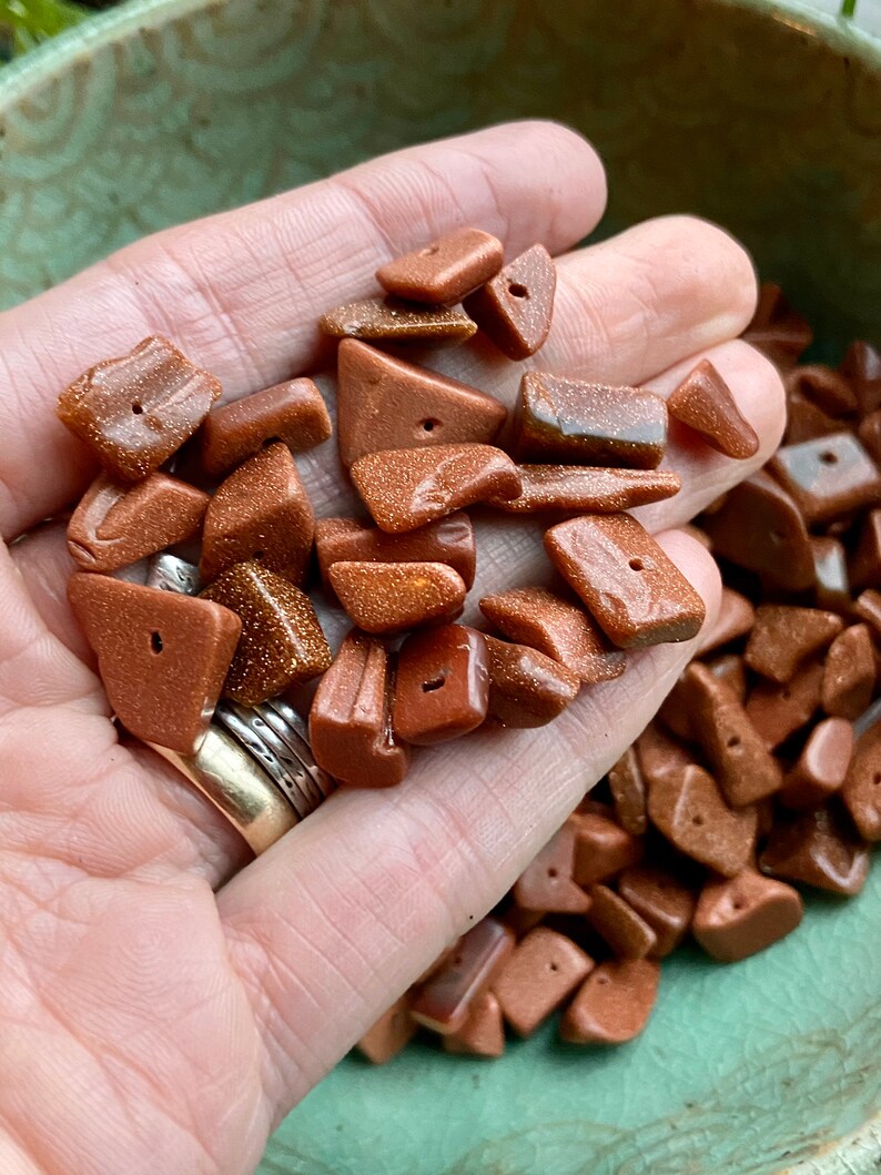 Destash 100/% cancer charity donation. Large goldstone glass nuggetchip beads