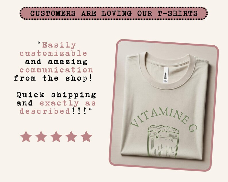 May include: A folded, light beige t-shirt with a crew neck. The shirt features the text "VITAMINE G" in green, along with a green illustration of a glass of beer. The image also includes customer testimonials and the phrase "CUSTOMERS ARE LOVING OUR T-SHIRTS".