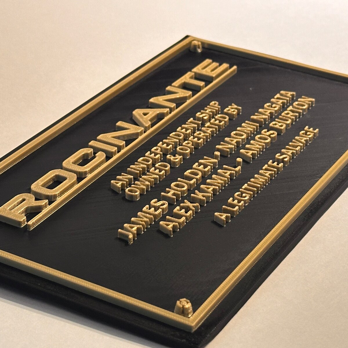 Rocinante Legitimate Salvage Wall Plaque the Expanse, Black and Brass 6x10