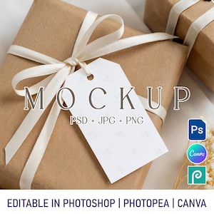 May include: A mockup image featuring a wrapped gift box in brown paper, tied with a cream-colored ribbon and a white tag. The tag reads "MOCKUP" with "PSD + JPG + PNG" below. The text "EDITABLE IN PHOTOSHOP | PHOTOPEA | CANVA" is at the bottom.