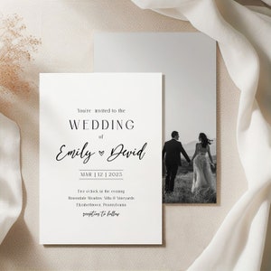 May include: A wedding invitation featuring a black and white photograph of a couple walking away from the camera. The invitation text reads "You're invited to the wedding of Emily & David, MAR | 12 | 2025, Five o'clock in the evening, Rosendale Meadow Villa & Vineyards, Elizabethtown, Pennsylvania, reception to follow."