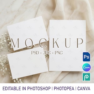 May include: A digital mockup set featuring three blank white rectangular cards arranged on a light fabric surface. The text MOCKUP PSD + JPG + PNG is centered. Icons for Photoshop, Canva, and Photopea are visible along with the text at the bottom.