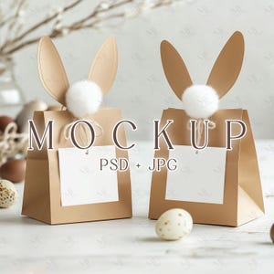 May include: Two brown paper gift bags with bunny ear tops and white fluffy tails. The bags have white labels with the text "MOCKUP PSD + JPG".