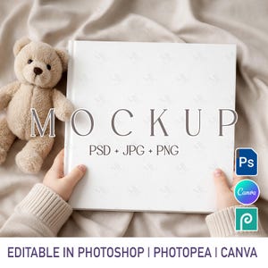May include: A white book mockup with the word "MOCKUP" in gray. The text "PSD + JPG + PNG" is below the word "MOCKUP". A beige teddy bear is next to the book. The text "EDITABLE IN PHOTOSHOP | PHOTOPEA | CANVA" is at the bottom.