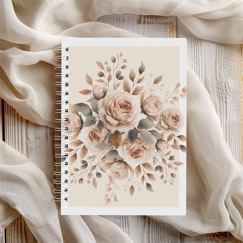 May include: A spiral bound notebook with a beige cover featuring a watercolour illustration of a bouquet of blush pink roses and brown leaves.