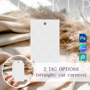May include: Two white rectangular tags with a hole at the top, one held by a hand. The text "2 TAG OPTIONS (straight/ cut corners)" is visible. The background includes soft, neutral tones and design software icons.